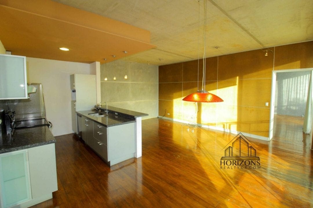 Apartamento con rooftop privado en Guachipelín - cocina y comedor