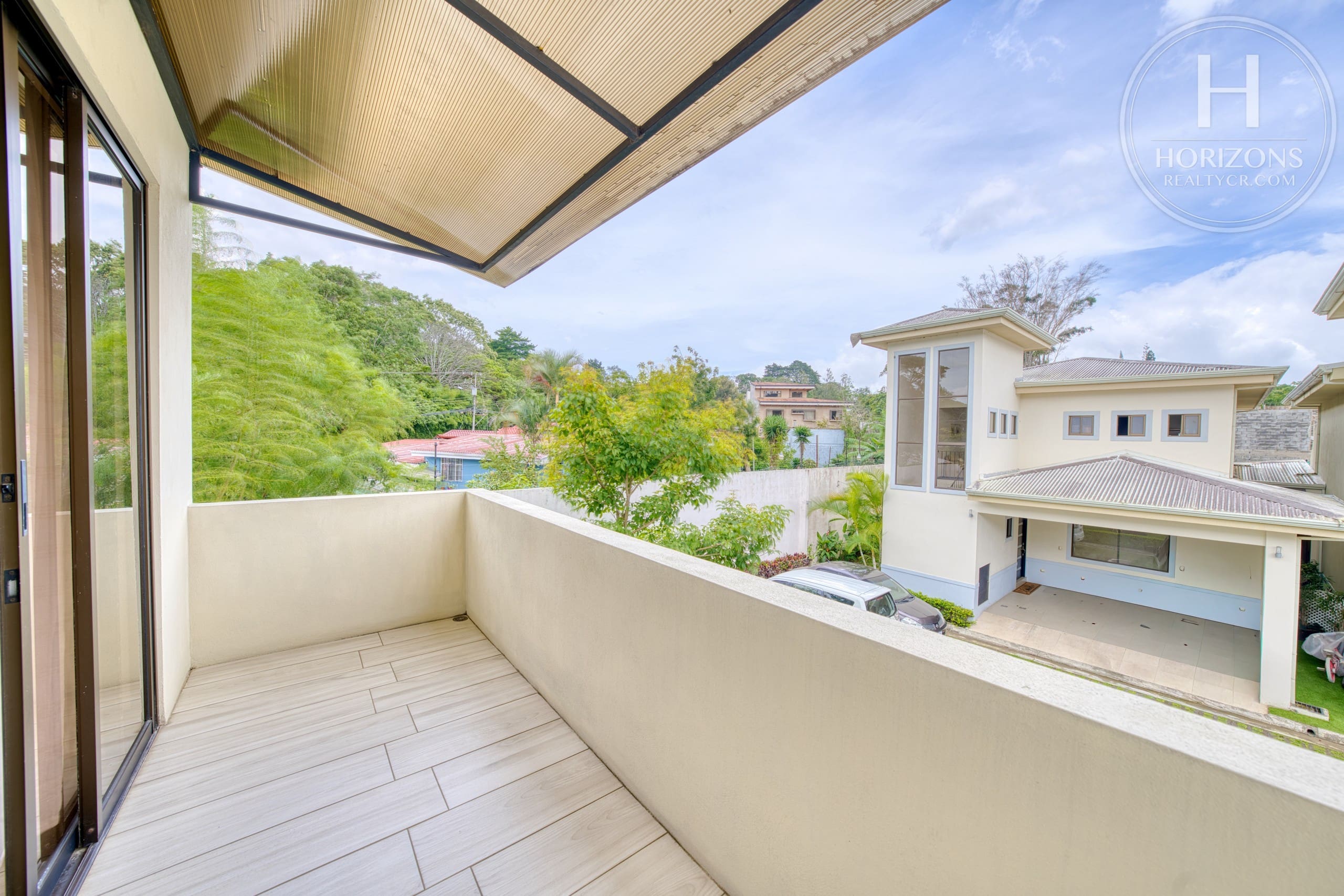 Casa con jardín en Residencial Altamonte Curridabat - balcón 1