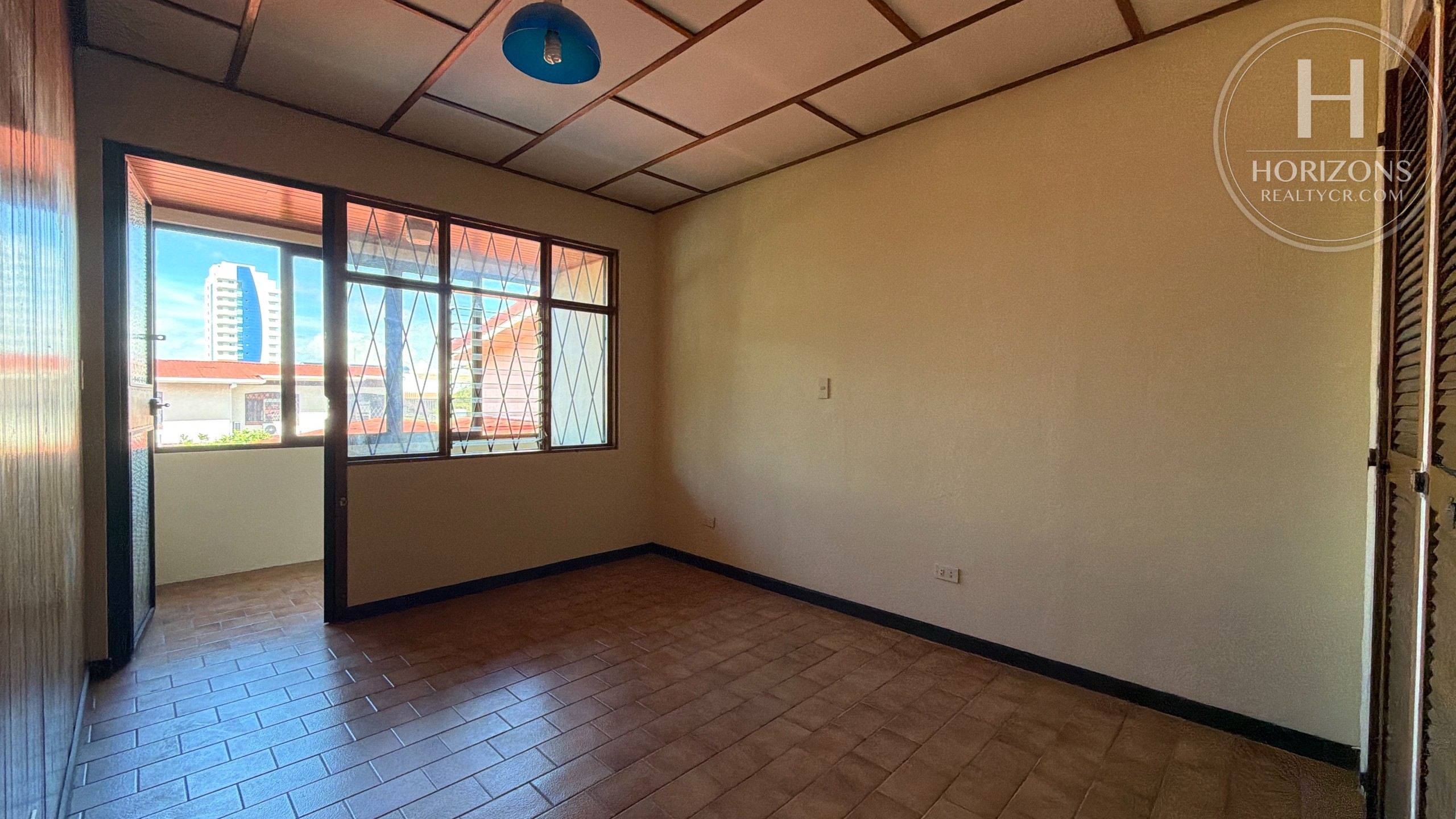 Apartamento en La Sabana - habitación con salida al balcón